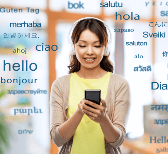A woman with headphones on her smartphone with the word